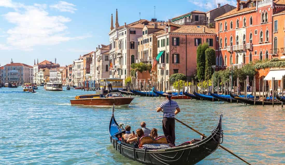 Experience a gondola ride in Venice 