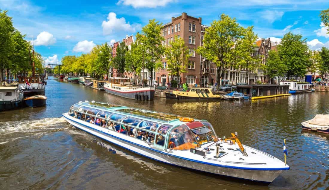 Enjoy a canal tour of Amsterdam