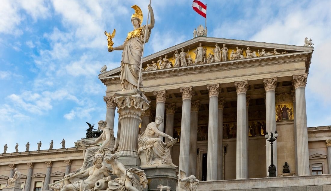 See Austrian Parliament Building in Vienna