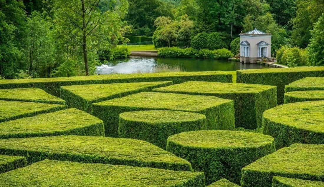 The topiary garden and lakeside pavilion at Oakfield Park.