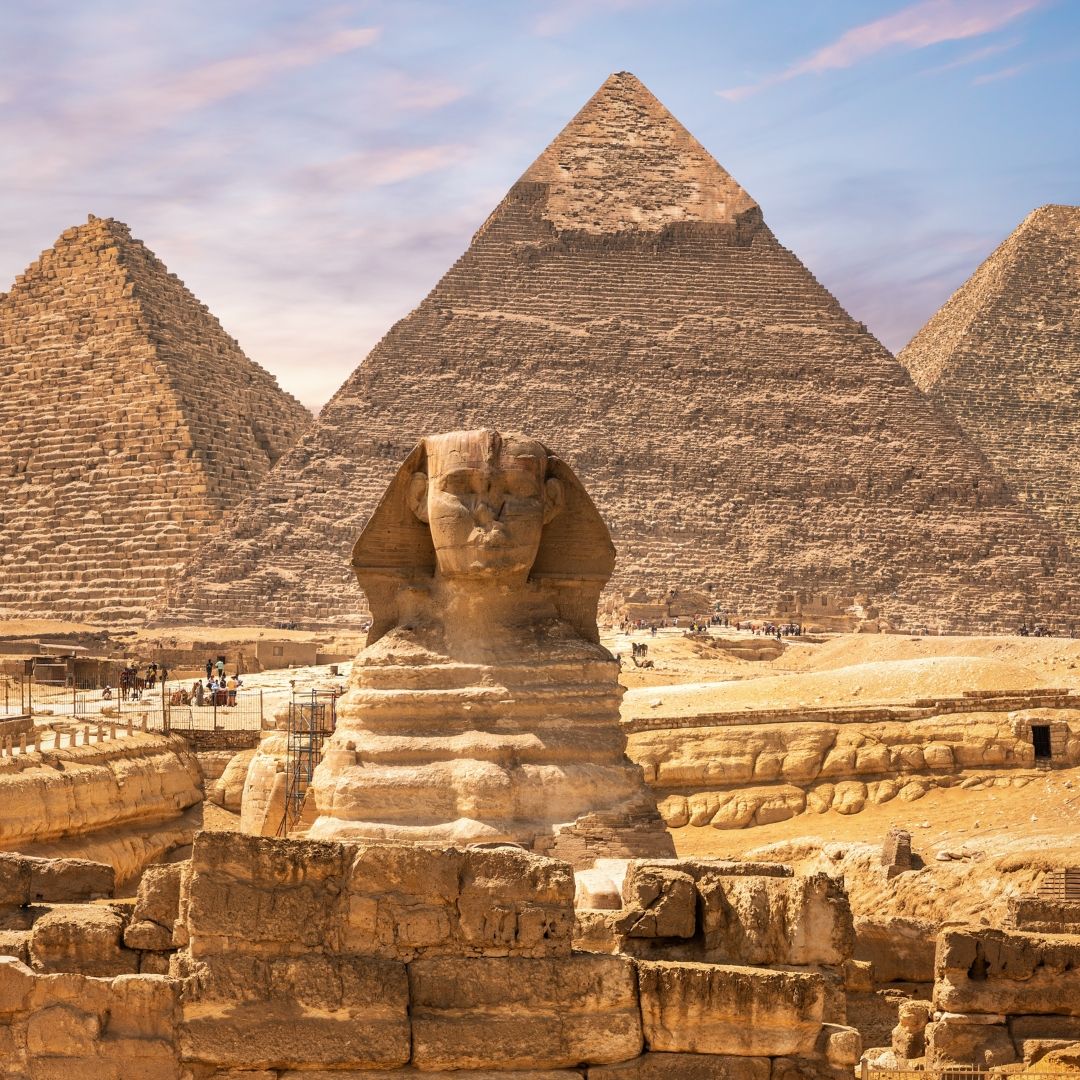 the Great Sphinx of Giza with the Pyramids of Giza in the background
