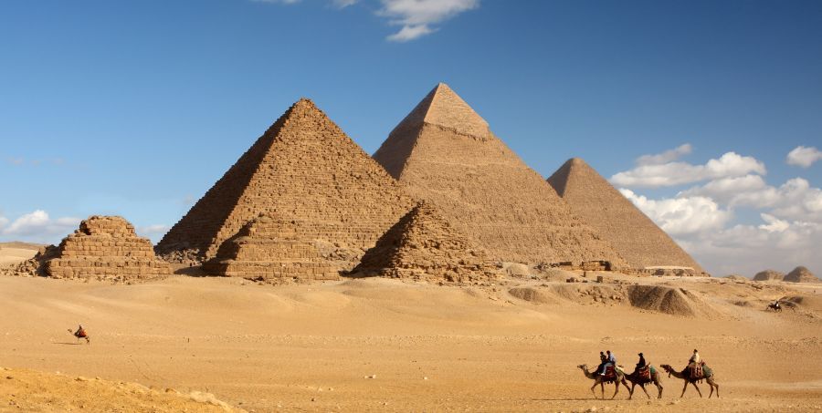 pyramids-of-giza-camels-egypt-desert.jpg