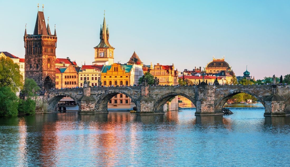Cross Charles Bridge in Prague