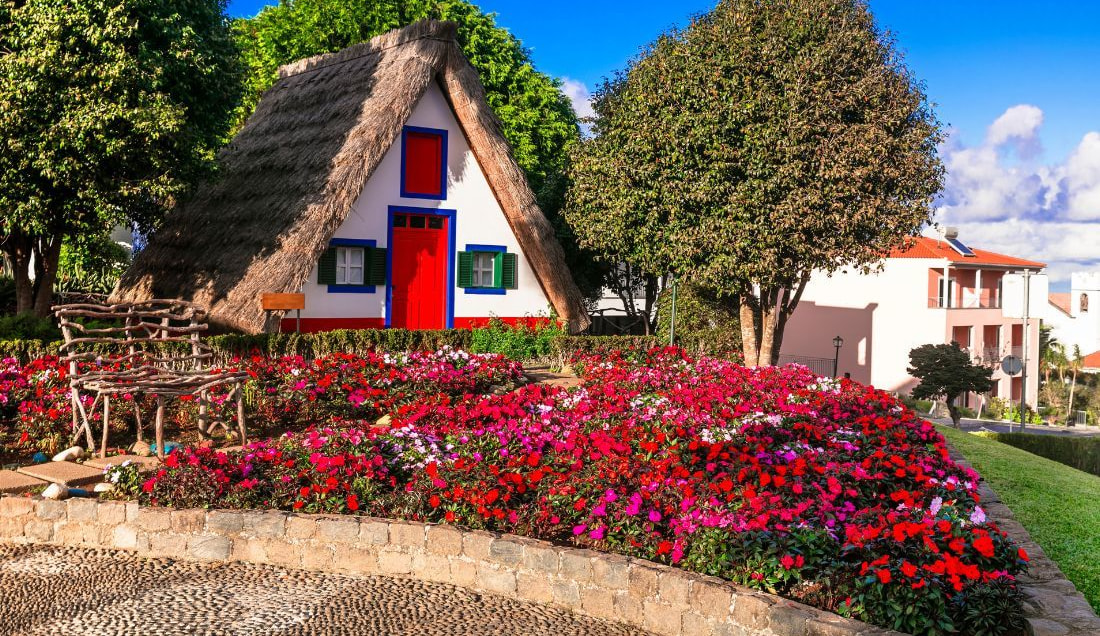 See the iconic thatched roofs of Santana