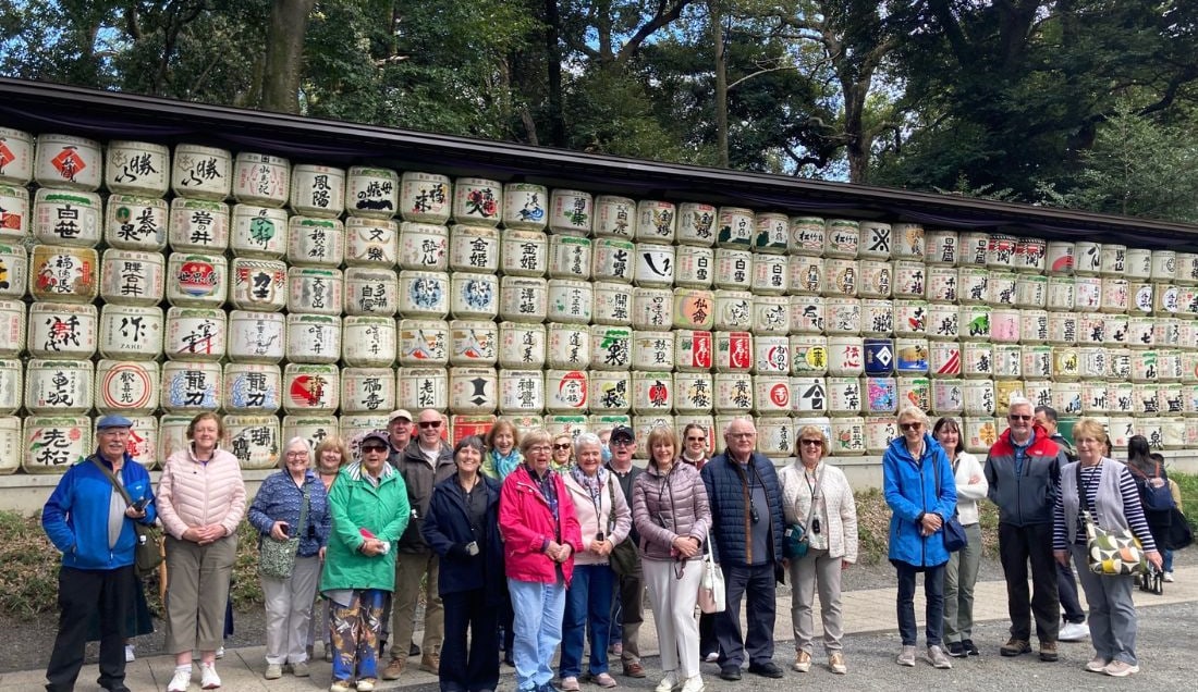 See the sake barrel display at Meiji Shrine in Tokyo