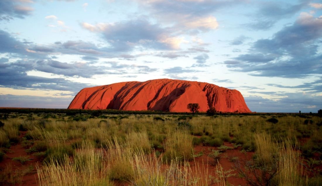 Experience an incredible sunset at Uluru.