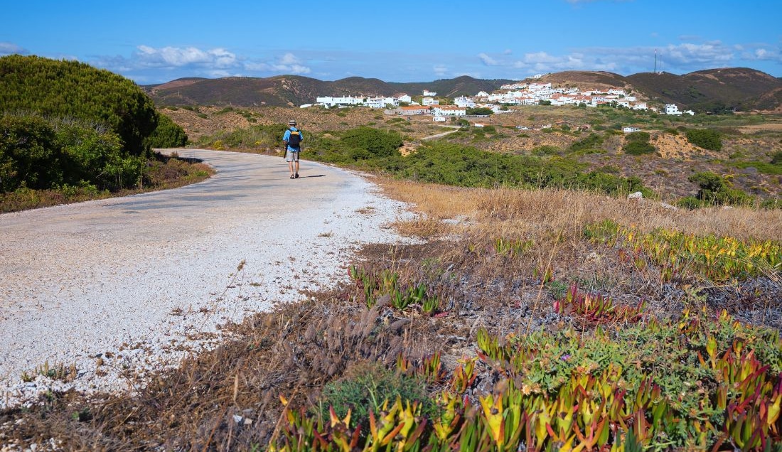 Walk towards the hillside village of Carrapateira on the Rota Vicentina trail.