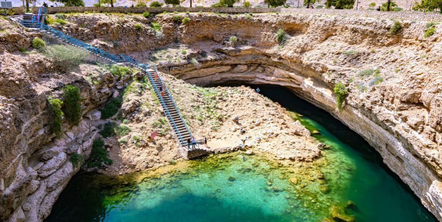 Visit Bimmah Sinkhole.