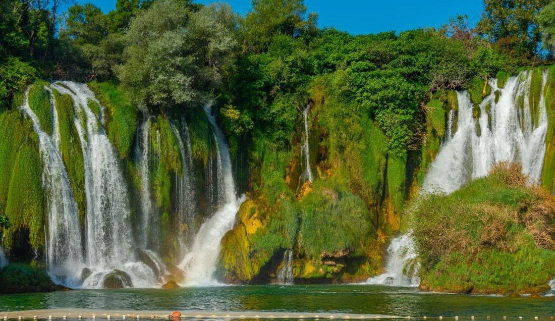Visit Kravica Waterfalls, one of Bosnia's top natural highlights.