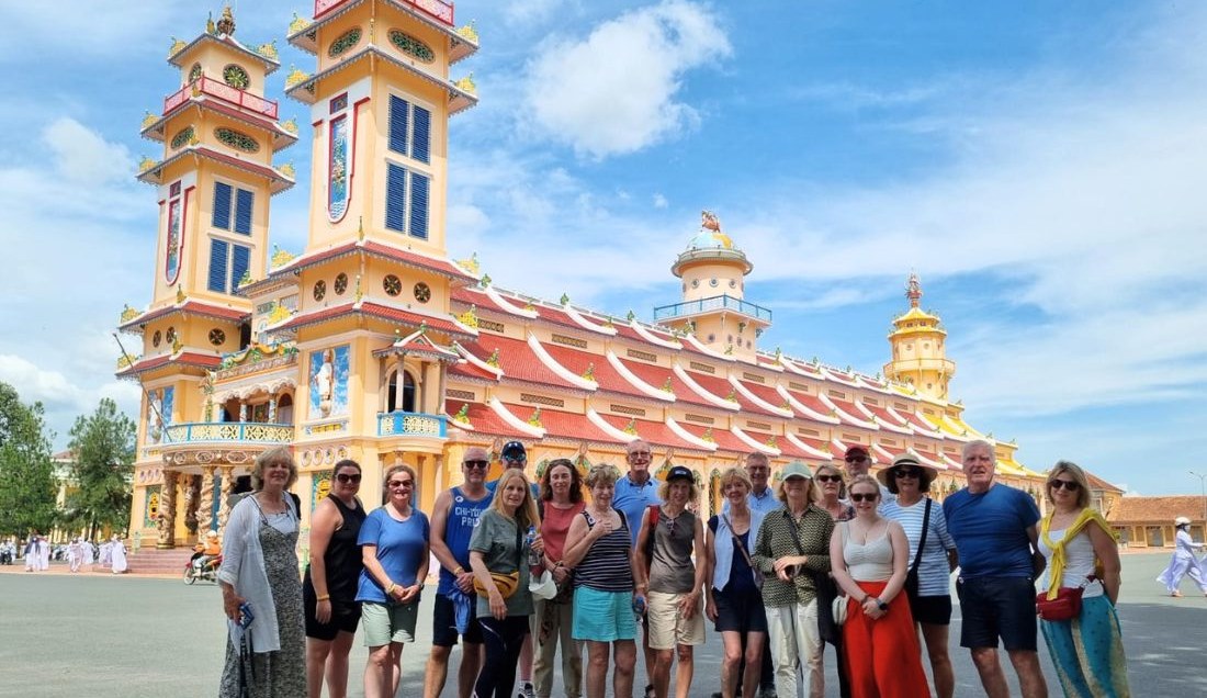 Explore the Cao Dai Holy See temple in Tay Ninh.
