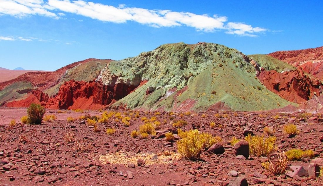 Visit Rainbow Valley in the Atacama Desert.