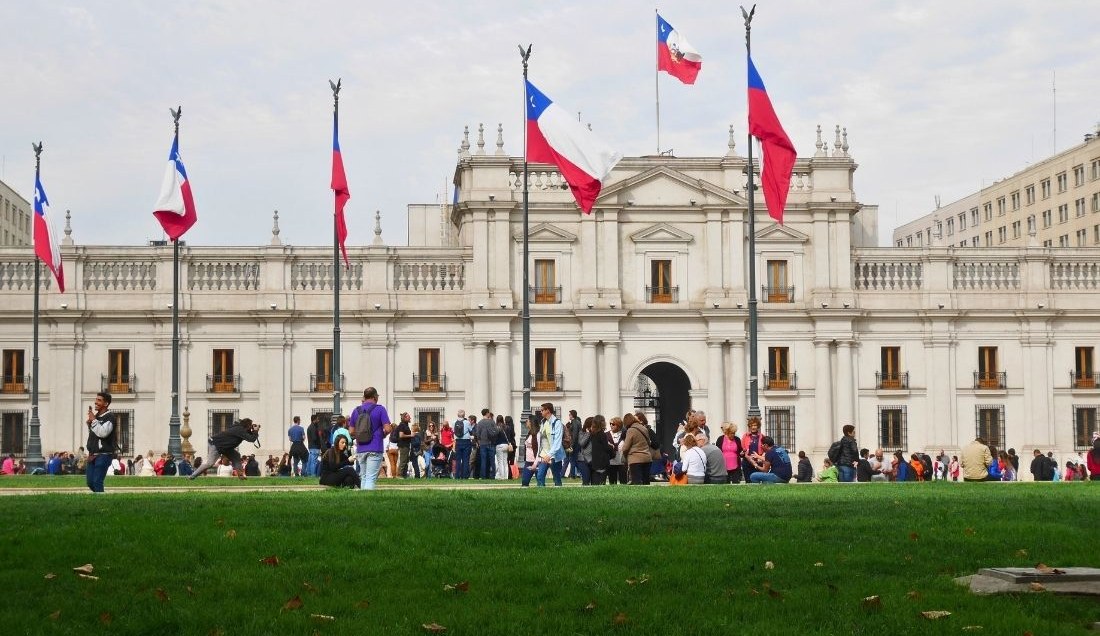 See the Palacio de La Moneda, the presidential palace in Santiago.