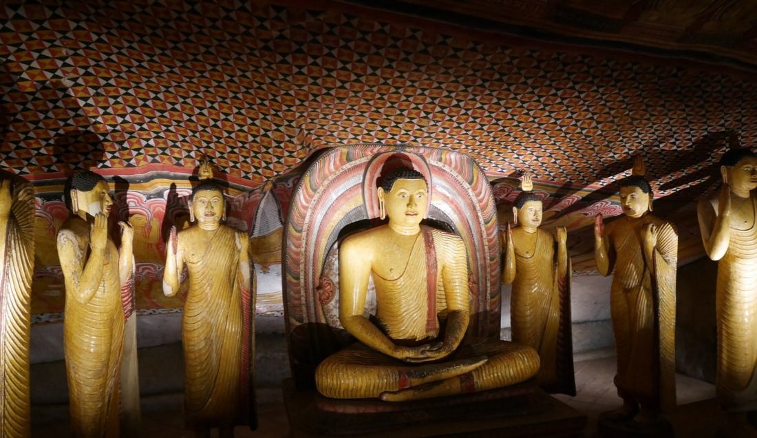 Admire the statues and artwork in Dambulla Cave Temp,e.